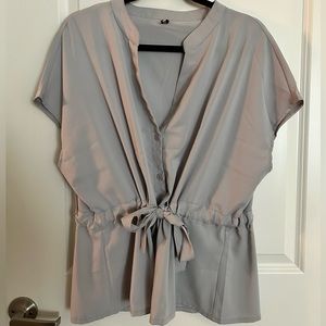 Grey Short Sleeve Blouse with Buttons. Never worn. Size XL.